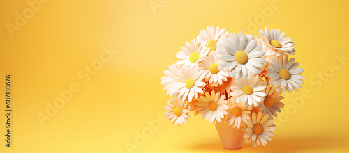 Chamomile daisy flowers against yellow gradient background. Aesthetic floral scene. © JulMay