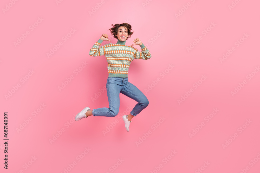 Full body size photo of jumping up active young lady directing fingers herself best personal brand owner isolated on pink color background
