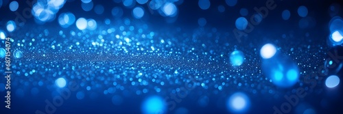 Enchanting Blue Bokeh Lights Banner on Black Background. Abstract Glowing Dots with Defocused Brightness. Shiny Glitter Decoration, Perfect for Celebration and Magical Design.
