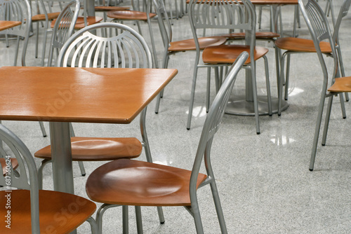 Tables and chairs in an empty cafe or restaurant