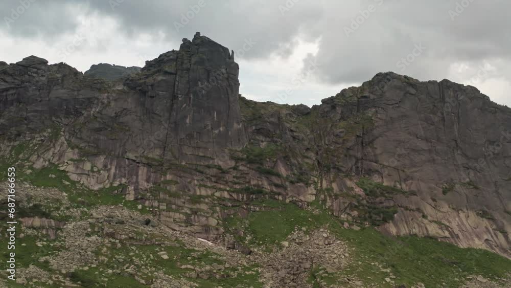 The Majestic Peak: A Towering Mountain with a Commanding and Impressive Rock Face The Majestic Peak: A Towering Mountain with a Commanding and Impressive Rock Face