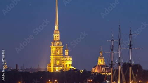 Peter and Paul Fortress after sunset, founded by Peter the Great in 1703, transitions from day to night in this timelapse. Located in St. Petersburg, Russia photo