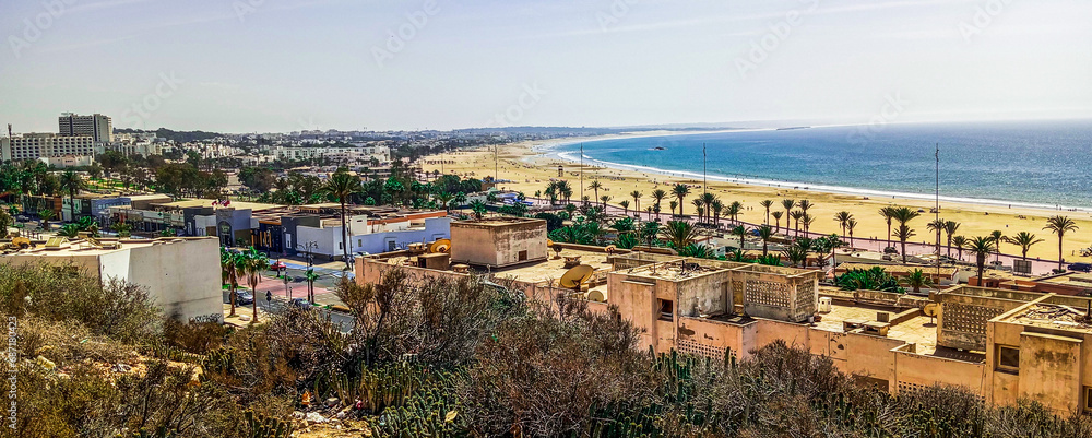 Natural view of Agadir city and nice beach on sunny day with beautiful sky.  Moroccan atlantic ocean.