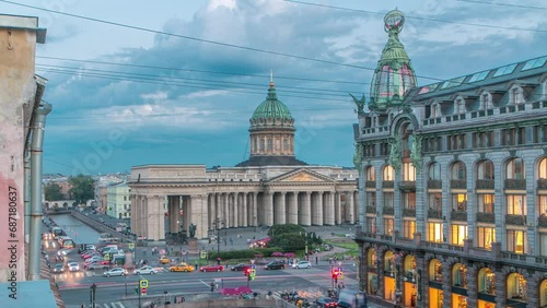 Kazan Cathedral and Singer House from a rooftop, timelapse captures the top view along Griboyedov Canal's waterfront. Traffic flows on the road below. Saint Petersburg, Russia photo