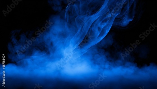 Abstract blue smoke on black background. Pink mist on the ground. Fog backdrop.