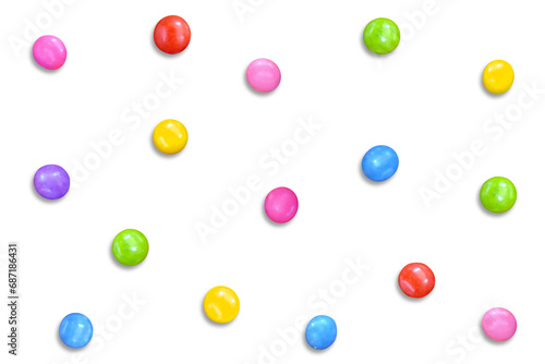 Smarties Chocolate Drops in Different Colors Scattered on The Background photo