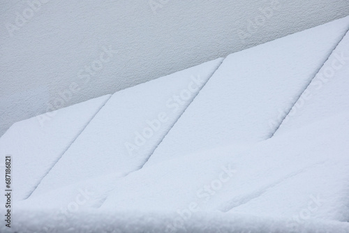Snow-Covered Solar Panels on a Garage  Winter-Proof Renewable Energy