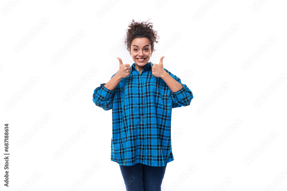 Fototapeta premium portrait of a young pretty woman with curled hair smiling on a white background