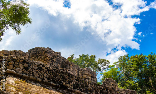 Coba Maya Ruins pyramids and ball game tropical jungle Mexico.