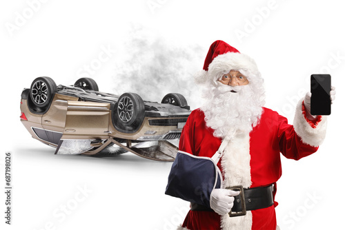 Santa Claus with an arm injury from a car accident showing a smartphone