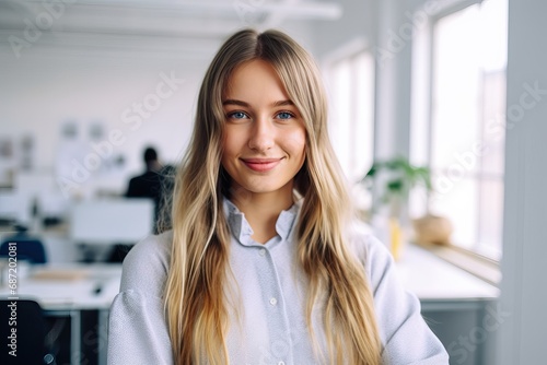 Portrait of Confident smiling young professional business woman corporate leader, happy female employee, company sales marketing manager, standing arms crossed in office,