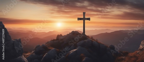 Cross on Top of a Mountain under a divine sunset.