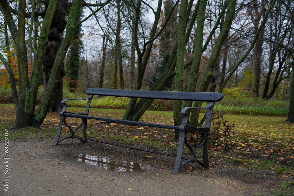 Copenhagen, Denmark - November 19, 2023: Copenhagen Frederiksberg Gardens Park Bench Copenhagen, Denmark - November 19, 2023: Copenhagen Frederiksberg Gardens Park Bench