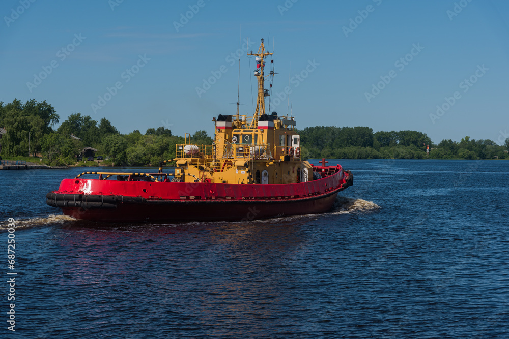 towboat close-up on the river on a sunny summer day.