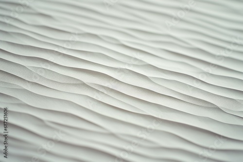 A detailed view of a white sand surface. Can be used for backgrounds, textures, or beach-related concepts