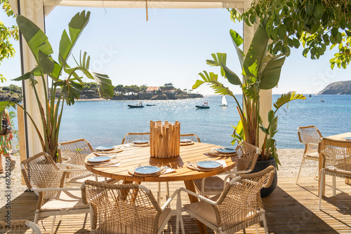 restaurant with a table overlooking the sea  on the Costa Brava on a summer day