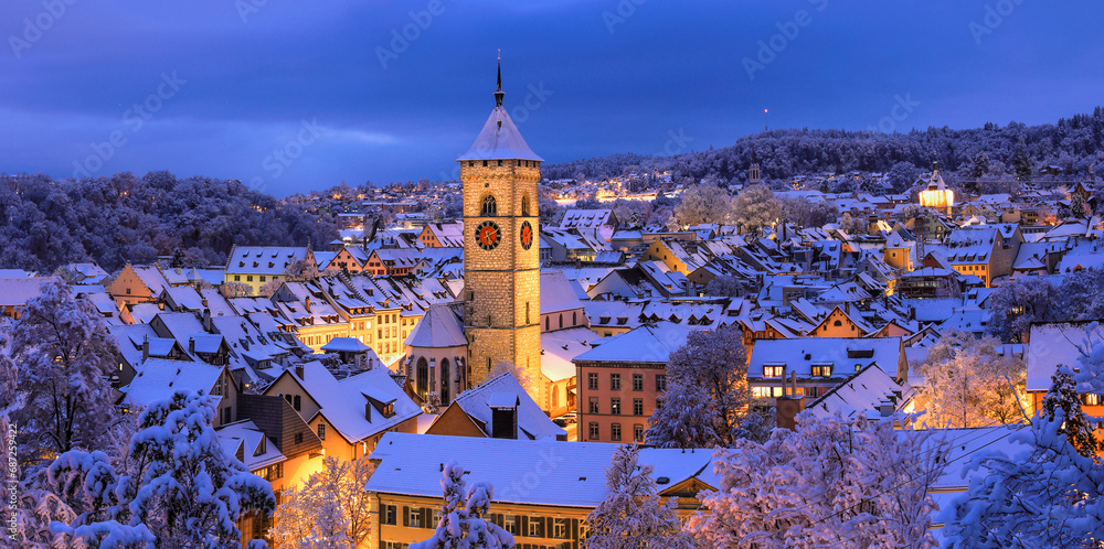 Obraz na płótnie Panorama view of the old Swiss city of Schaffhausen town in winter with Christimas season illumination at dusk w salonie