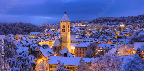 Panorama view of the old Swiss city of Schaffhausen town in winter with Christimas season illumination at dusk photo