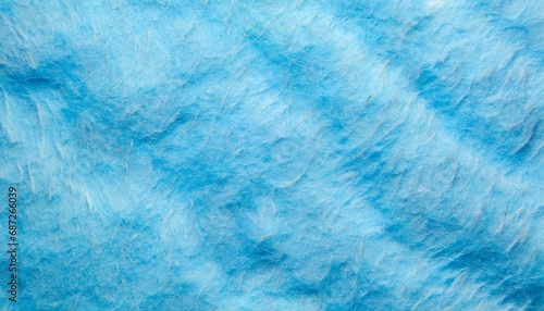 light blue background of felt fabric texture of woolen textile