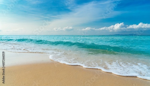 soft blue ocean wave on clean sandy beach