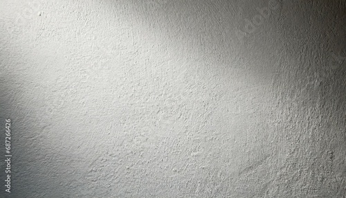 white even cement plaster wall with light gradient background photo