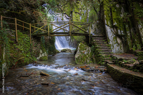 Fraga da Pena Waterfall trail in Serra do Açor mountain, Pardieiros, Arganil, Coimbra, Portugal. photo
