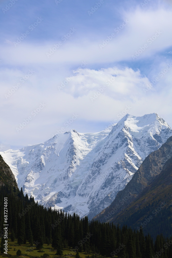 Tenth stage of Ak-Suu Traverse trek with a view of Karakol peak and Aylanish glacier in Kyrgyzstan