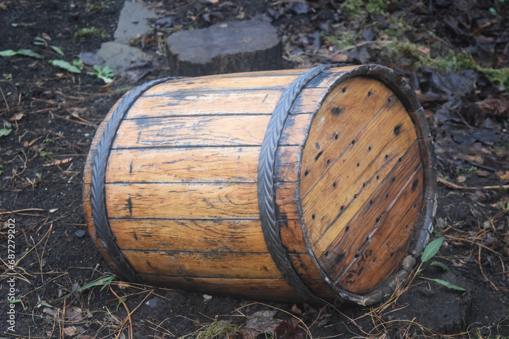 Wine or cognac barrels in the cellar of the winery, Wooden wine barrels in perspective. wine vaults. vintage oak barrels of craft beer Wine or cognac barrels in the cellar of the winery, Wooden wine barrels in perspective. wine vaults. vintage oak barrels of craft beer