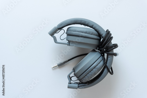 pair of over-the-ear headphones on blank paper