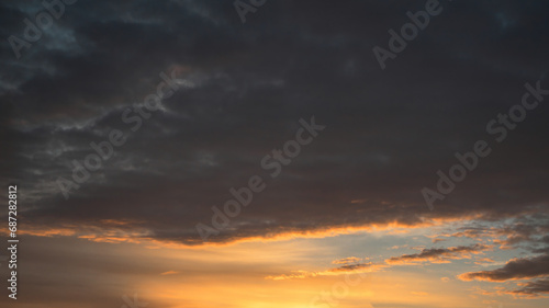 Beautiful sky background - Sunset Sunrise sky with light clouds and real sun.