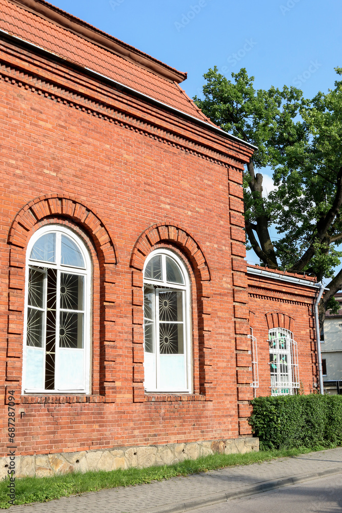MYSLENICE, POLAND - JULY 15, 2020: An old brick building in Myslenice, Poland.