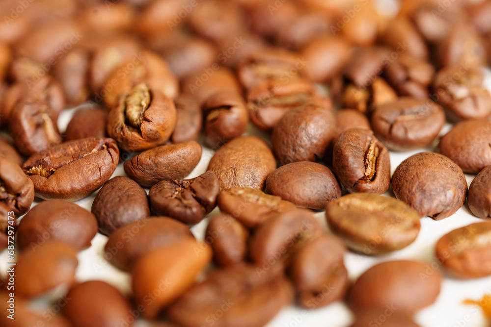 Naklejka premium Roasted coffee beans. background. 