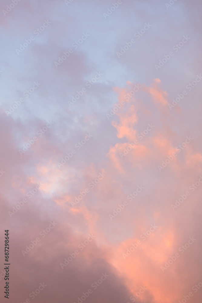 Golden, orange and blue clouds at sunset