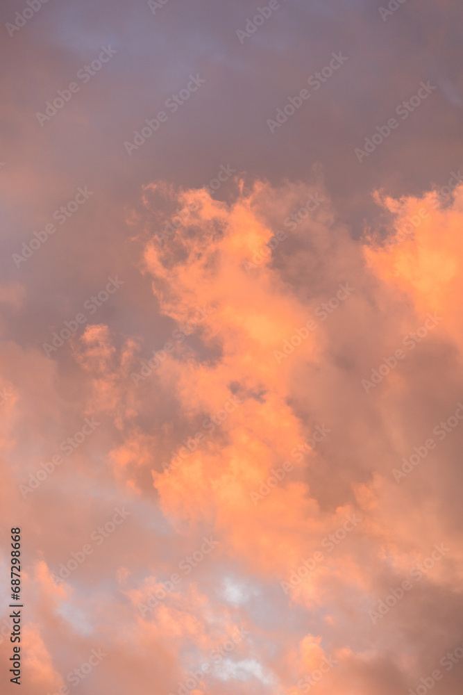 Golden, orange and blue clouds at sunset