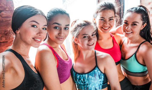 Group smiling sporty women after training in fitness studio. Fitness, sport concept © My Ocean studio