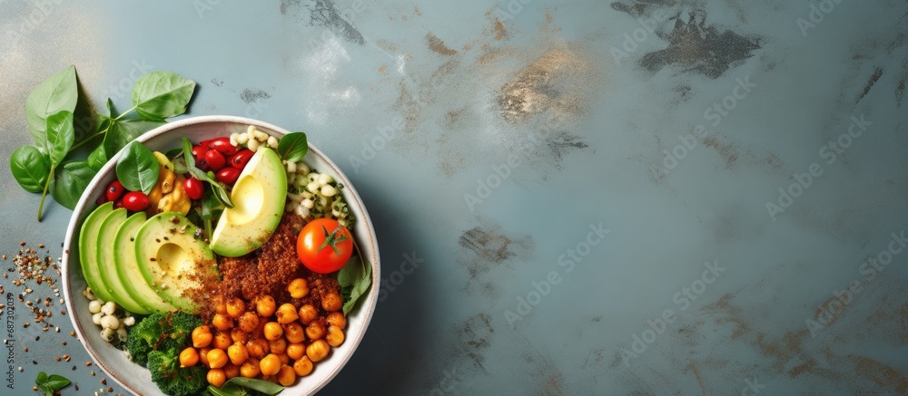 Avocado quinoa sweet potato tomato spinach and chickpeas vegetable salad in a healthy vegan lunch bowl Copy space image Place for adding text or design Avocado quinoa sweet potato tomato spinach and chickpeas vegetable salad in a healthy vegan lunch bowl Copy space image Place for adding text or design
