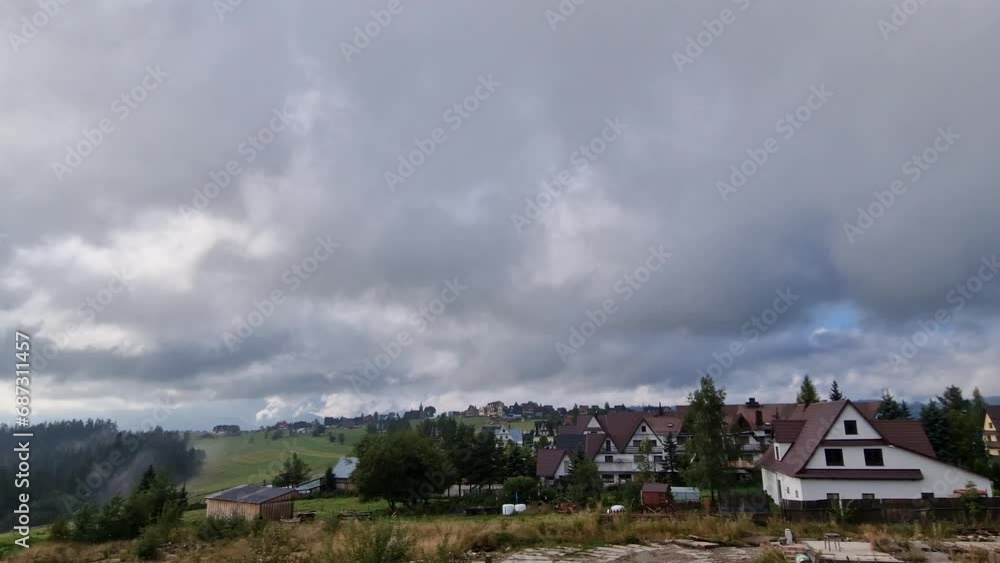 Time lapse. cloudscape view of the Tatras and Beskids with a mountain village. Poland Time lapse. cloudscape view of the Tatras and Beskids with a mountain village. Poland