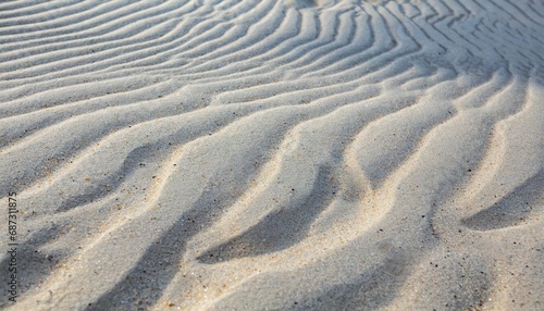 sand pattern as background zen pattern in white sand beach sand texture in summer sun