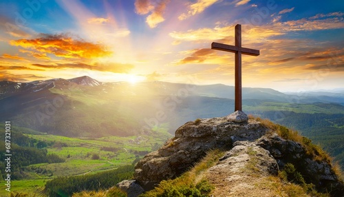 christian cross on top of a mountain sunset landscape easter wallpapers generative ai © Irene