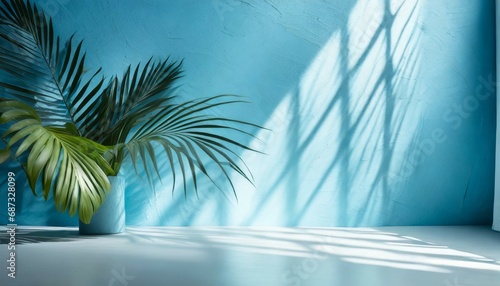 minimal abstract light blue background for product presentation shadow of tropical leaves and curtains window on plaster wall © Irene