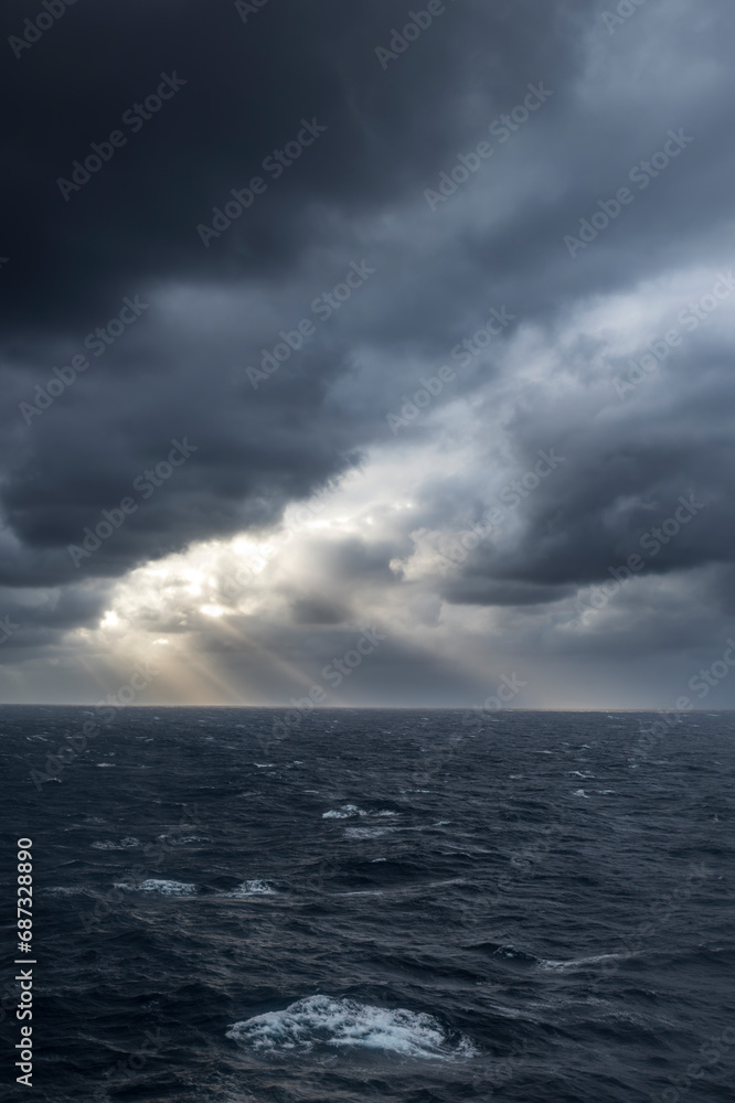 Sun shining through Ocean Storm