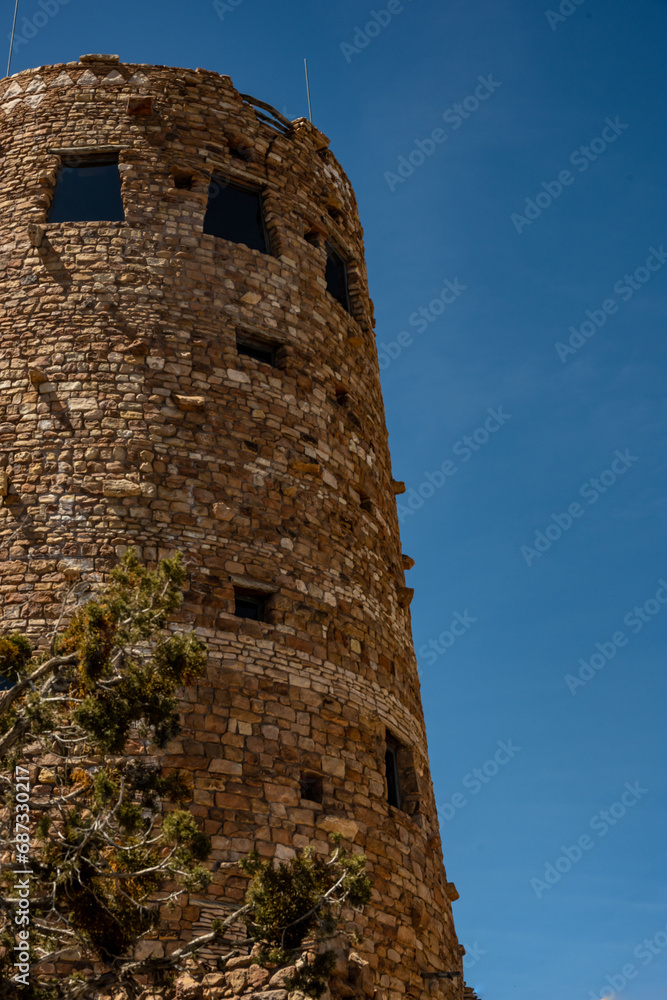 Desert Watchtower In Grand Canyon Against Blue Sky Desert Watchtower In Grand Canyon Against Blue Sky