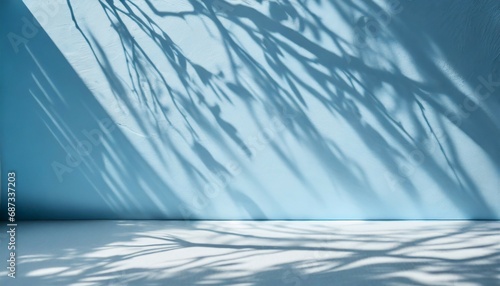 minimalistic abstract light blue background for product presentation featuring gentle light and intricate shadows cast by tree branches on the wall made with generative ai technology