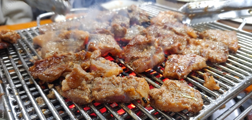 Charcoal grilled pork ribs enjoyed by Koreans