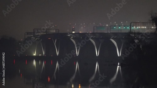 Washington DC USA A night view of the Woodrow Wilson Memorial Bridge over the Potomac River and the 495 Interstate on a foggy night photo