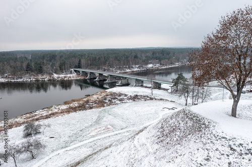 Aerial view of a river bridge that separates forest from grasslands, Lithuania © Krzysztof Bargiel