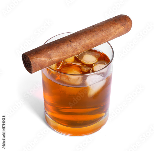 Glass of whiskey and cigar isolated on white