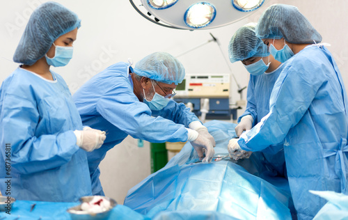 Professional anesthesiologist doctor medical team preparing patient to gynecological surgery operating with surgery equipment, save life, pain, surgical, hurt in hospital operation emergency room