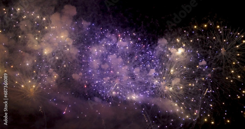 Purple Firework celebrate anniversary happy new year 2024, 4th of july holiday festival. Purple firework in night time celebrate national holiday. Violet firework Countdown to new year 2024 festival
