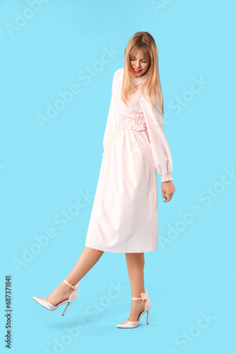Young woman dressed as doll...